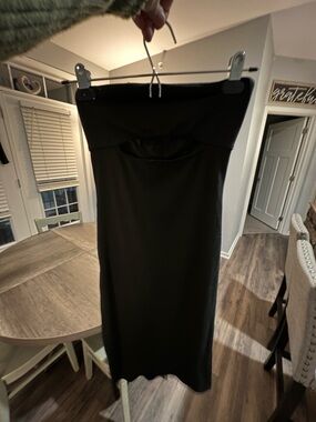Ribbed Black Tube Dress with a little Peek A Boo at Bust. Size Med